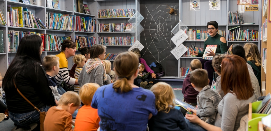 storytelling event in a library with children